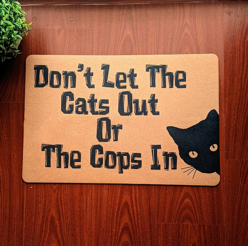Don't let the cats out funny door mat